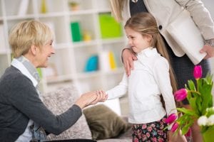 Little girl introduction her new babysitter